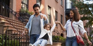 Family taking a walk down NYC street